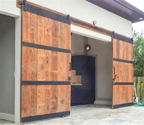 Pin on puertas | Exterior barn doors, Garage door design, Barn door garage