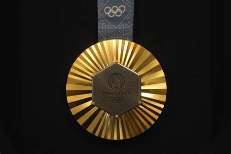 The Paris Olympics medals are embedded with pieces of the Eiffel Tower