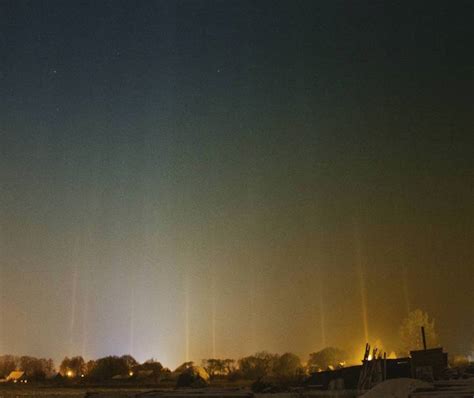 Rare Cold Weather Phenomenon Displays Mesmerizing Light Pillars in the Sky