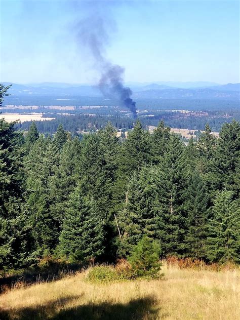 House fire near Deer Park sparks brush fire and several spot fires | News | khq.com