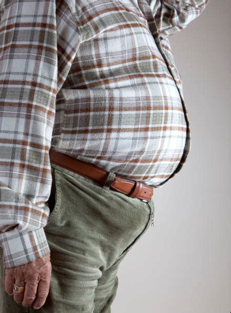 Best Pot Belly Men Stock Photos, Pictures & Royalty-Free Images - iStock