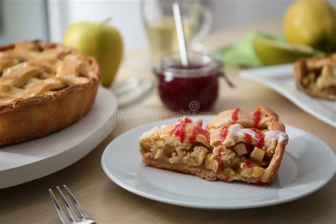 Plate and Board with Tasty Homemade Apple Pie on Table Stock Photo ...