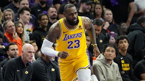 LeBron James shakes off injury to lead Los Angeles Lakers to win over Phoenix Suns | CNN