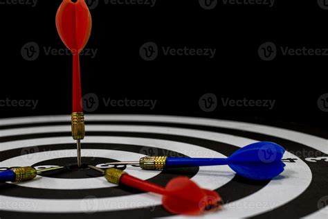 Dart board with dart on bullseye 2030672 Stock Photo at Vecteezy