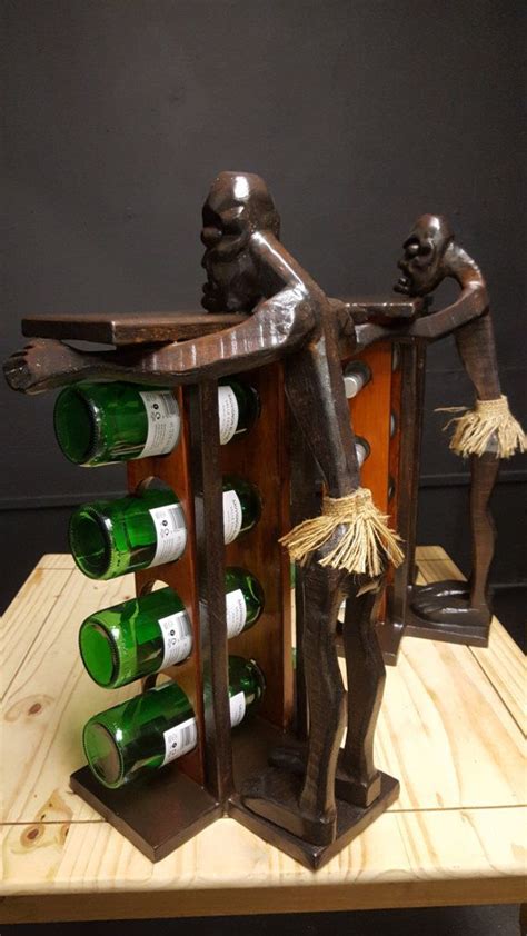 This is a very unique wine bottle display unit, each one holds 4 ...