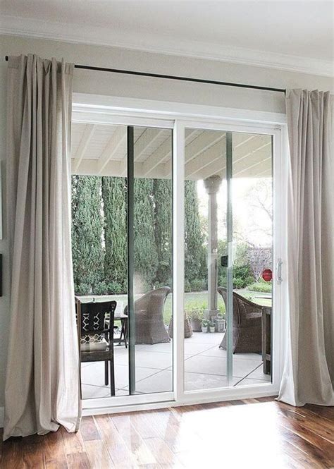 Patio doors with curtains – Builders Villa