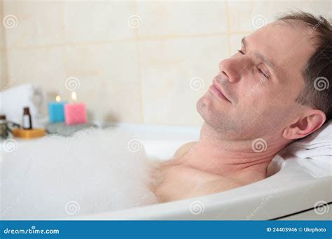 Man having a bath stock photo. Image of recreational - 24403946