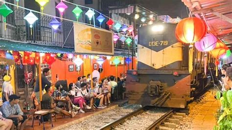 Hanoi's 'train street' cafes begin to reopen after 3-year hiatus ...