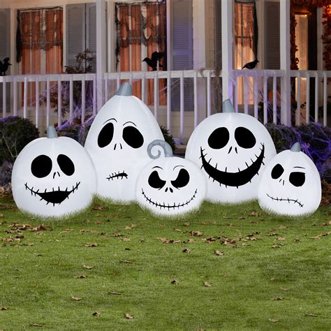 The Holiday Aisle® 5 Piece Jack Skellington Pumpkin Faces Character Halloween Inflatable Set ...