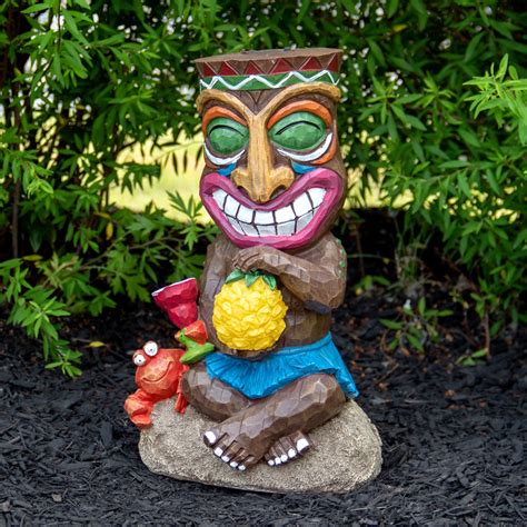 13.75" Solar Lighted Polynesian Outdoor Garden Smiling Tiki Statue | Christmas Central