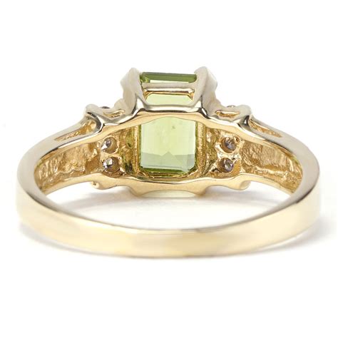 Emerald Cut Peridot and Diamond Ring in Yellow Gold | New York Jewelers Chicago