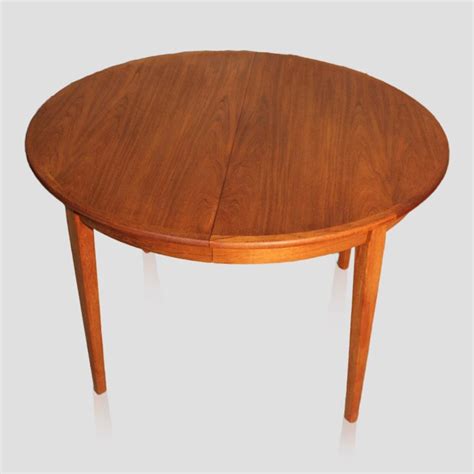 Large extendable round vintage teak Danish dining table by H. Sigh & Sons | #111355