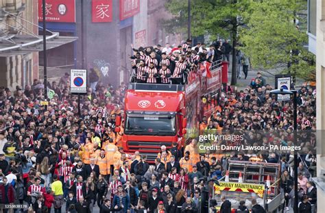 Sheffield United players on an open bus parade from Bramall Lane to ...