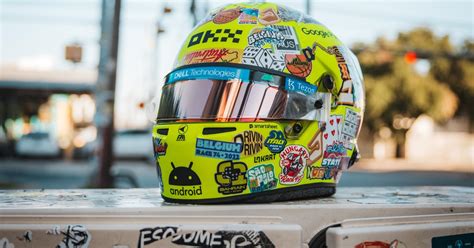 Norris unveils sticker helmet for 100th F1 race | RacingNews365