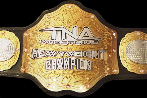 TNA Heavyweight Championship belt stolen right behind stagehand's back ...