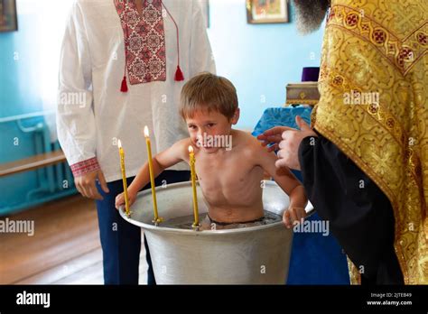 Orthodox baptism of a Belarusian child in a church Stock Photo - Alamy