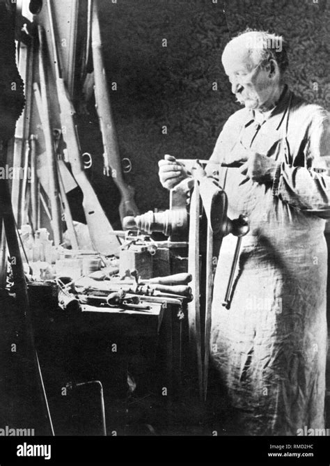 Gunsmith in his workshop Stock Photo - Alamy