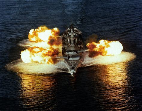 USS Iowa (BB-61) Firing her guns. Commissioned in 1942; Decommissioned ...