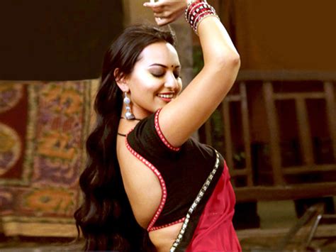 Sonakshi Sinha in Red Saree in Rowdy Rathore Movie : bollywood photos on Rediff Pages