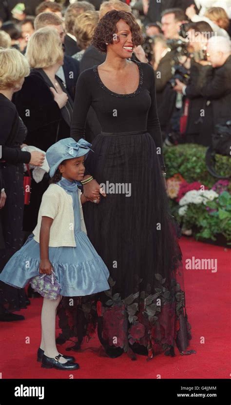 Pop star Whitney Houston arrives at the 71st Annual Academy Awards in ...