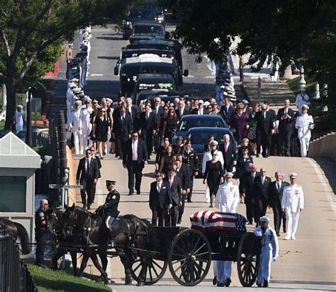 John McCain funeral: Senator laid to rest at US Naval Academy - BBC News