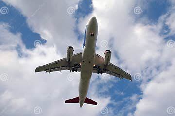 White plane and clouds stock image. Image of airfield - 2447707