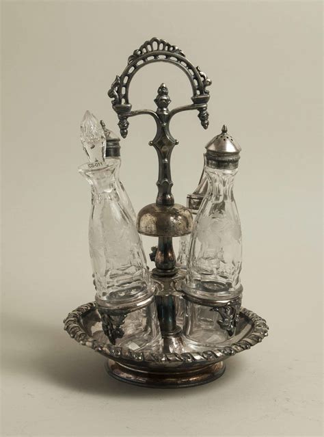 Glass Cruet Set with Bell | Witherell's Auction House