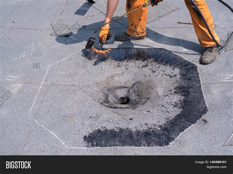 Roofer Doing Repair Roof Drain. Image & Photo | Bigstock