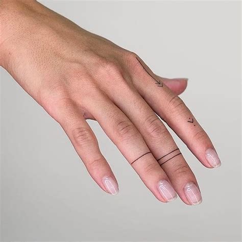 Simple line tattoos on fingers - Tattoogrid.net