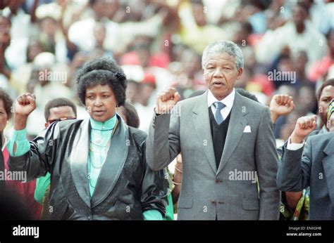 ANC leader Nelson Mandela with his wife Winnie in Soweto, Johannesburg, during a rally held to ...