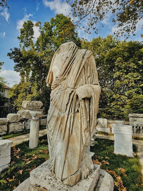 Photo of a Headless Ancient Statue · Free Stock Photo