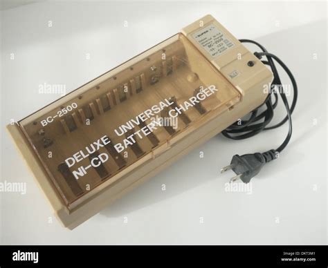 old rechargeable battery charger Stock Photo - Alamy