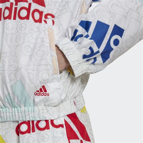 adidas Essentials Multi-Colored Logo Loose Fit Windbreaker - White ...