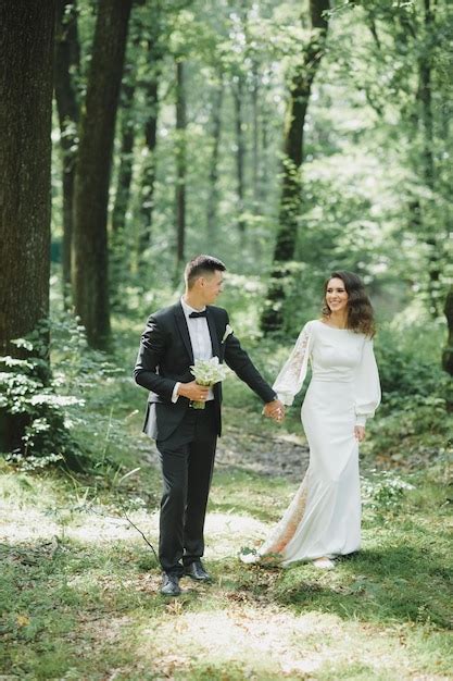 Premium Photo | Wedding couple in forest