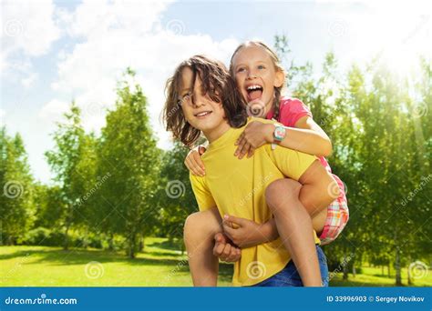 Piggyback ride stock image. Image of happiness, boys - 33996903