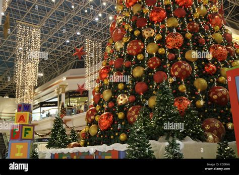 Christmas at the Wafi Mall. Tallest Christmas tree in all of Dubai, U.A.E Stock Photo - Alamy