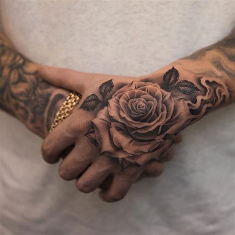 tattoos for men on neck #Tattoosformen | Hand tattoos, Rose tattoos for men, Rose hand tattoo