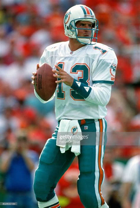 Quarterback Dan Marino of the Miami Dolphins in action against the... | Miami dolphins, Miami ...