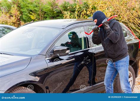 Car Burglar In Action Royalty Free Stock Images - Image: 35390329