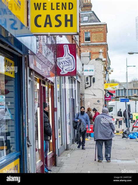 LONDON- APRIL 4th, 2024: Kilburn High Road in NW6 North West London. A ...