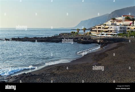 volcanic beach with black sand Stock Photo - Alamy