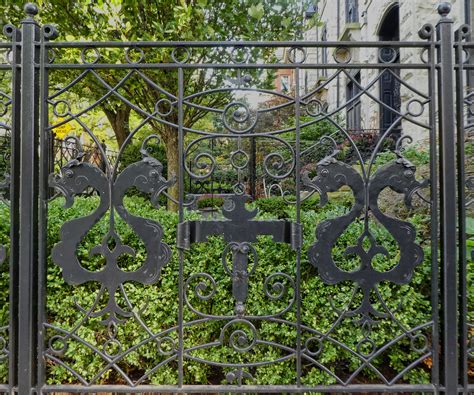 Schiller Street Dragon Fence | Wrought iron fence with drago… | Flickr