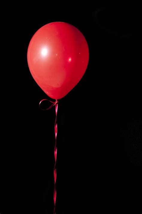 Free Stock Photo 3836-red floating balloon | freeimageslive