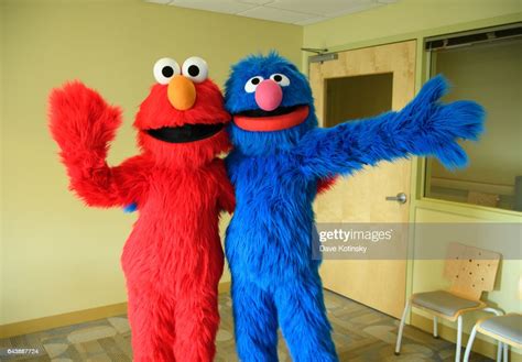 Elmo And Grover From Sesame Street Live Visit The Children Of Joseph... News Photo - Getty Images