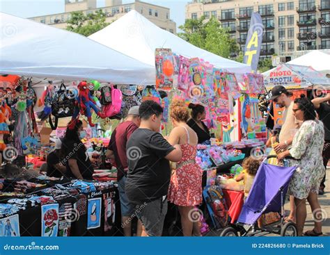 People Walk through Latino Summer Street Fair Food Festival in Chicago ...