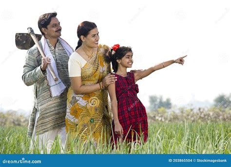 Happy Indian Family in Agricultural Field Stock Photo - Image of childhood, bonding: 203865504