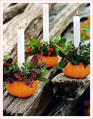 Decoration Idea: Mini Pumpkins or Gourds hollowed out and decorated with foliage and candl ...