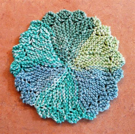 FREE PATTERN #11 - Knitlist Lacy Round Dishcloth | Dishcloth knitting patterns, Knitted ...