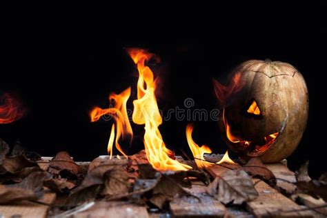 Halloween Pumpkin Spewing Flames Of Fire On A Black Background Stock Photo - Image of burn ...