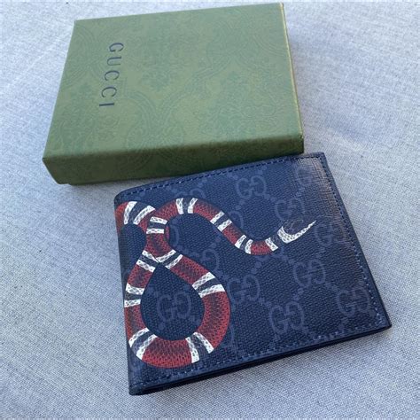 Gucci snake wallet barely used send offers. - Depop